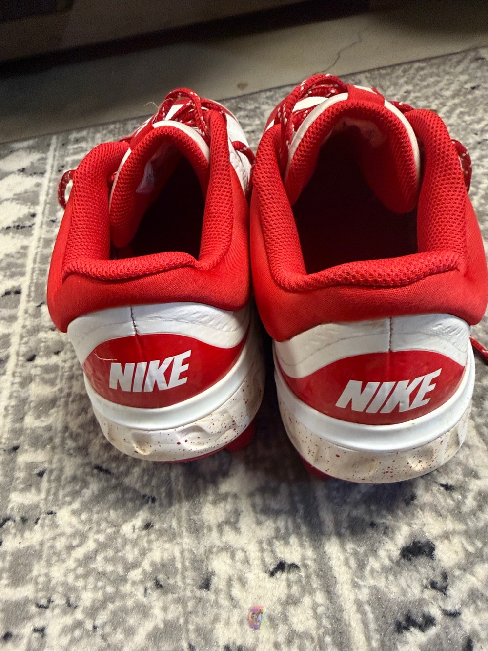 Nike mens Red and White Cleats with Bold Swoosh - Picture 3 of 6